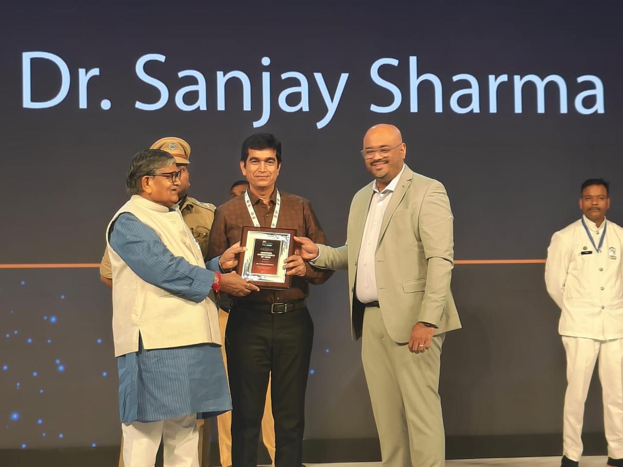 Receiving the Economic Times “Best Cardiologist” award, 2025